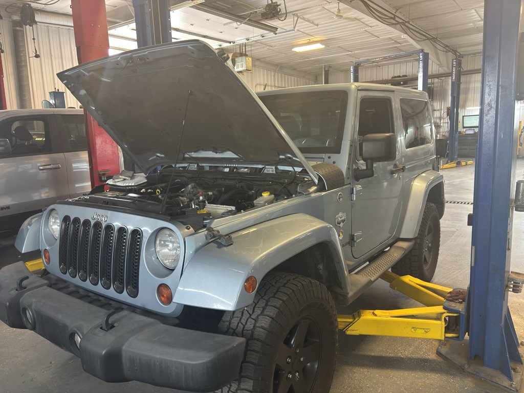 Used 2012 Grey Jeep Arctic image 1