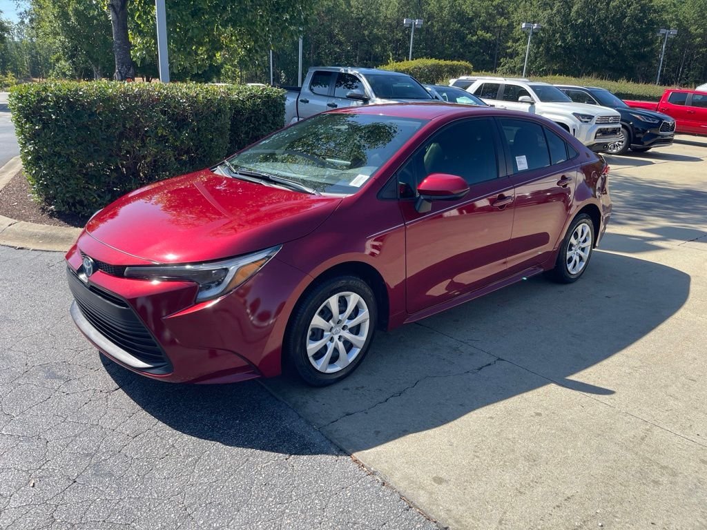Used 2025 Red Toyota LE image 2