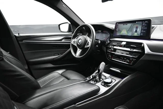 Used 2021 Black BMW M550i xDrive image 14