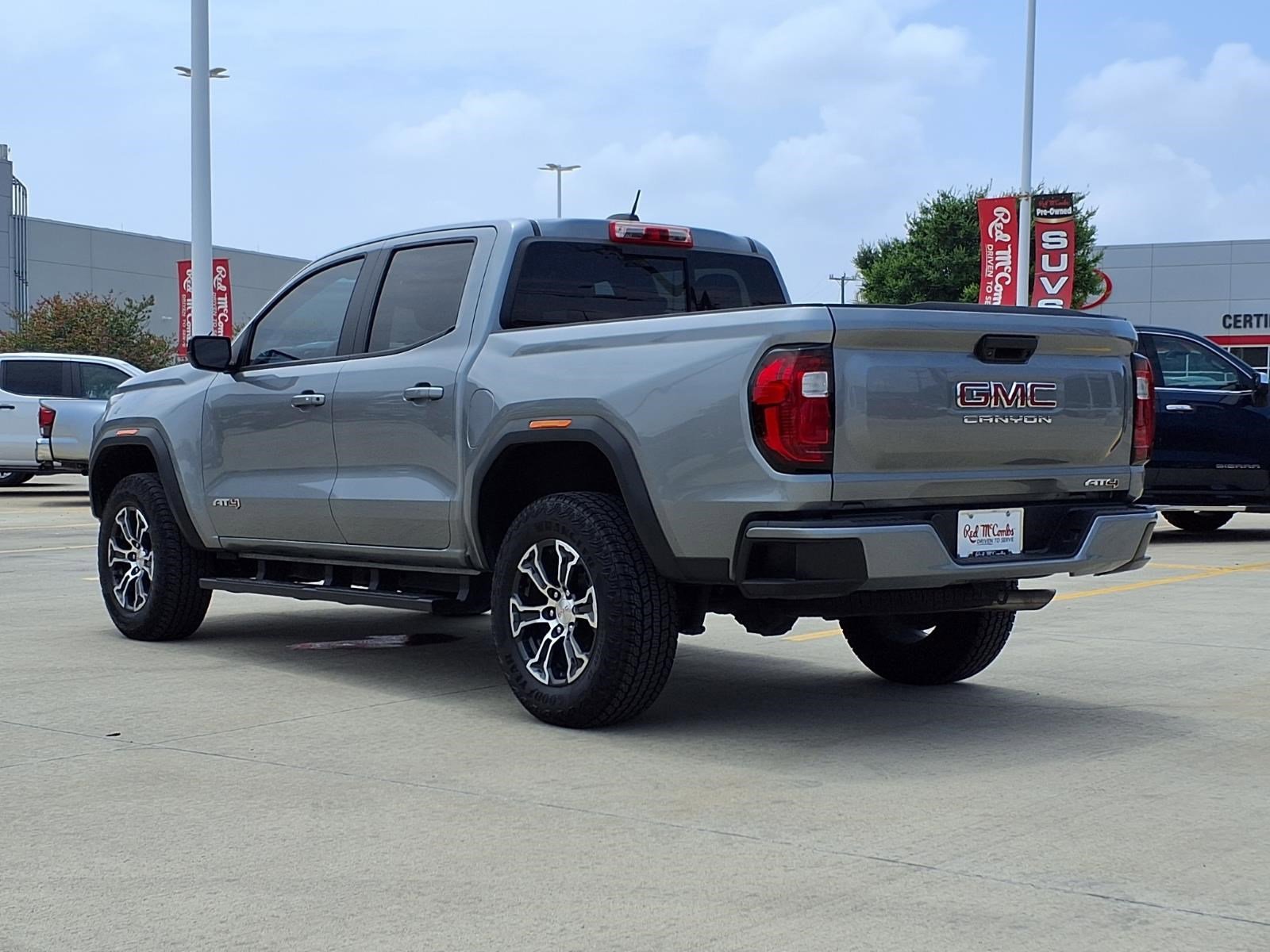 Used 2023 Sterling Metallic GMC 4WD AT4 image 7