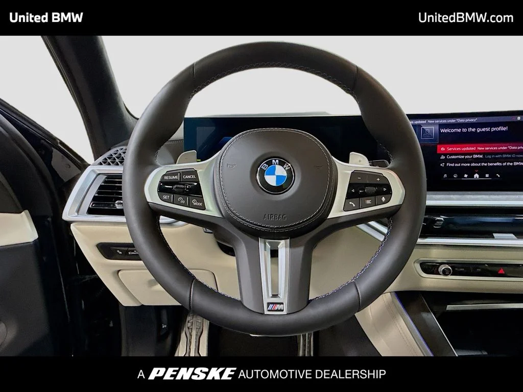 New 2026 Carbon Black Metallic BMW M60i image 6