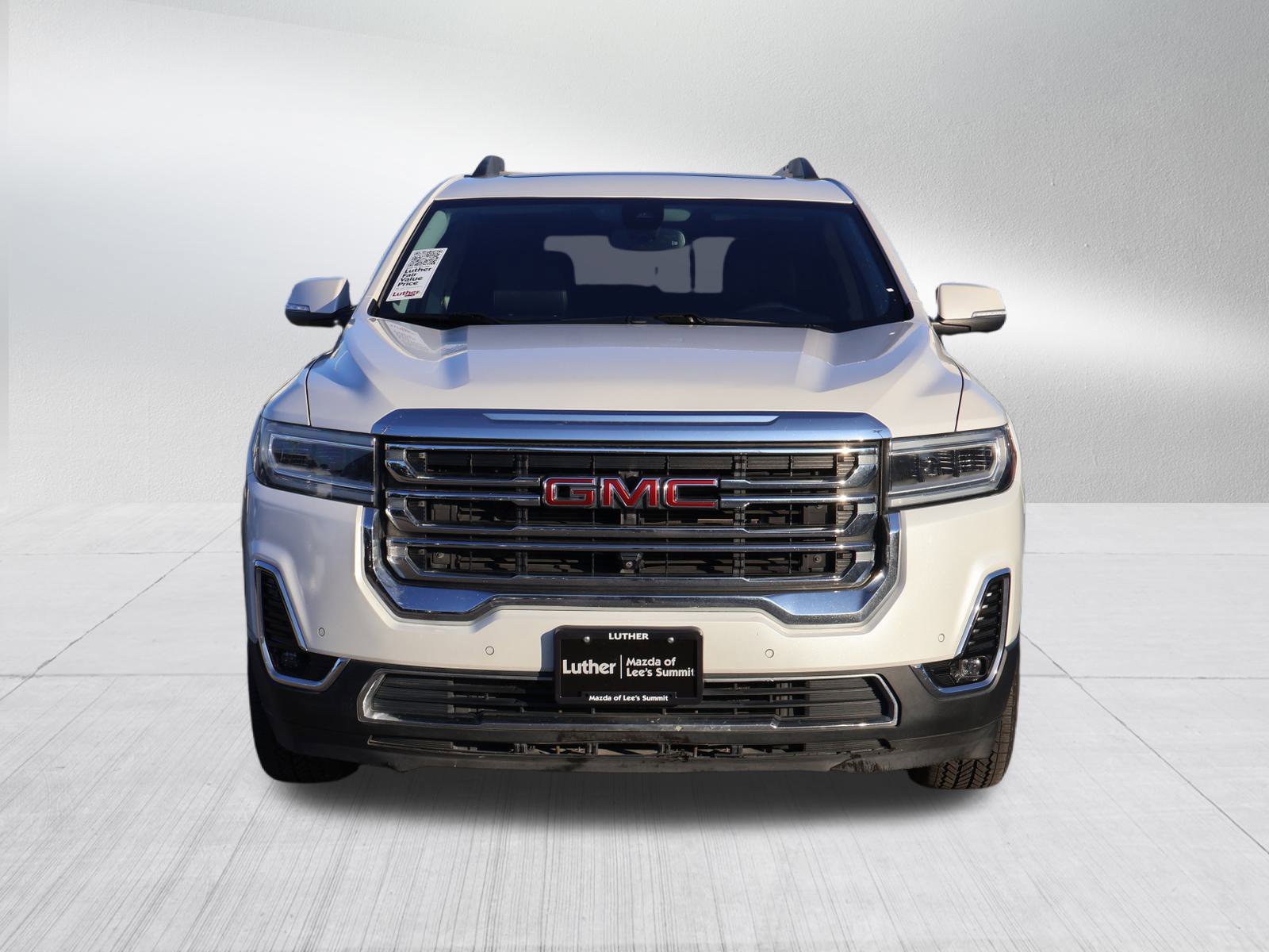 Used 2021 GMC Acadia SLT with VIN 1GKKNMLS9MZ108136 for sale in Kansas City