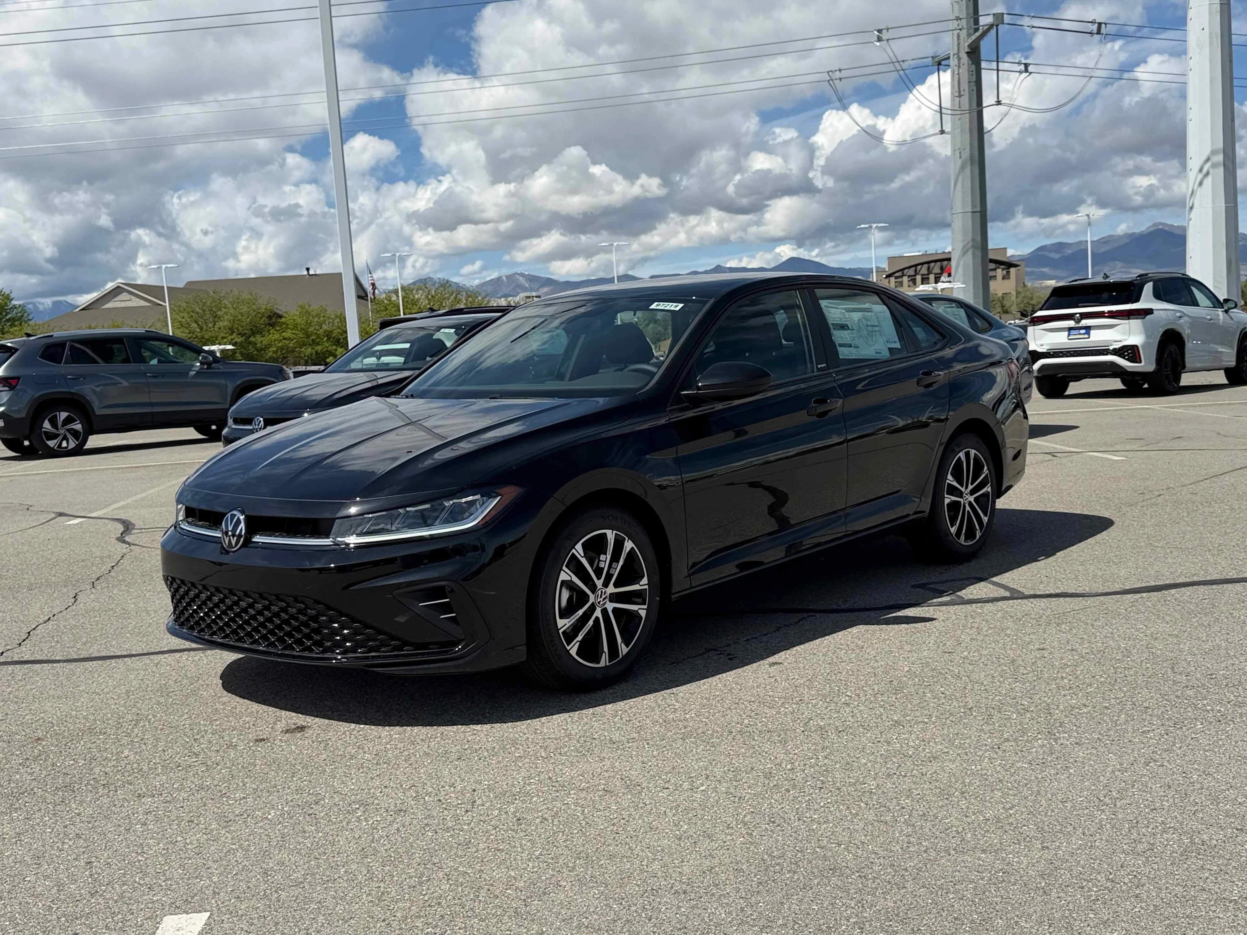 New 2026 Deep Black Volkswagen Sport image 1