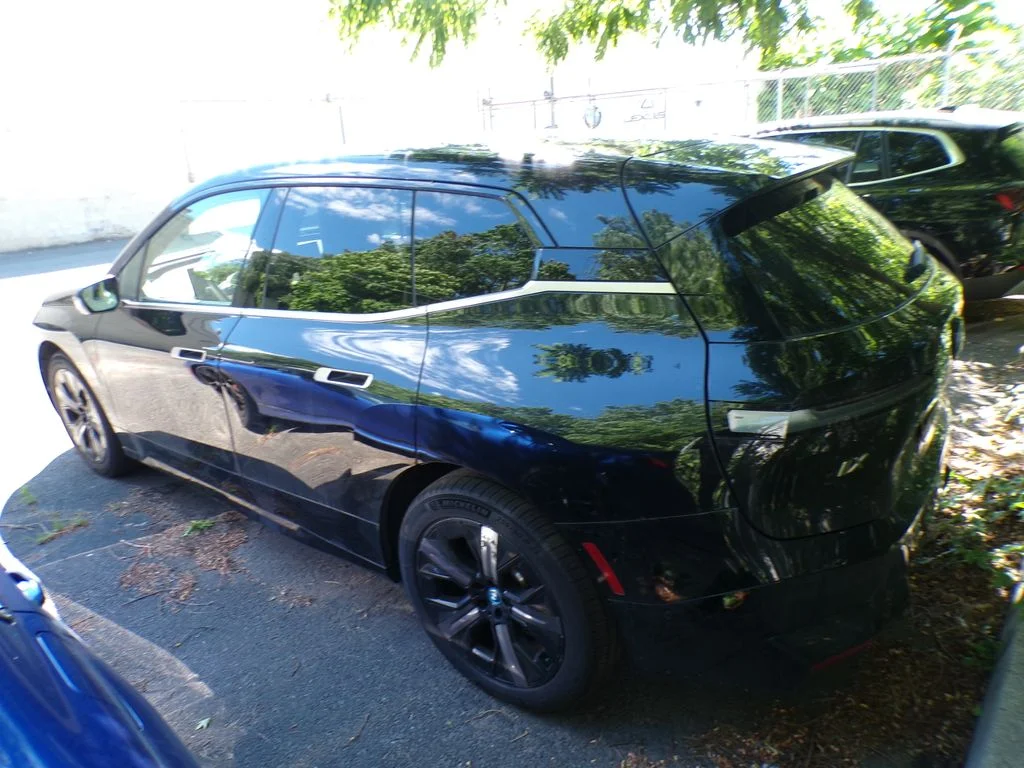Certified Used 2024 Black BMW xDrive50 image 3