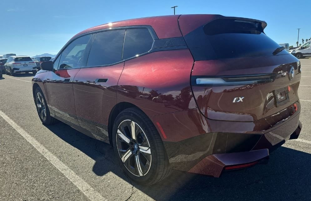 Used 2023 Red BMW xDrive50 image 4