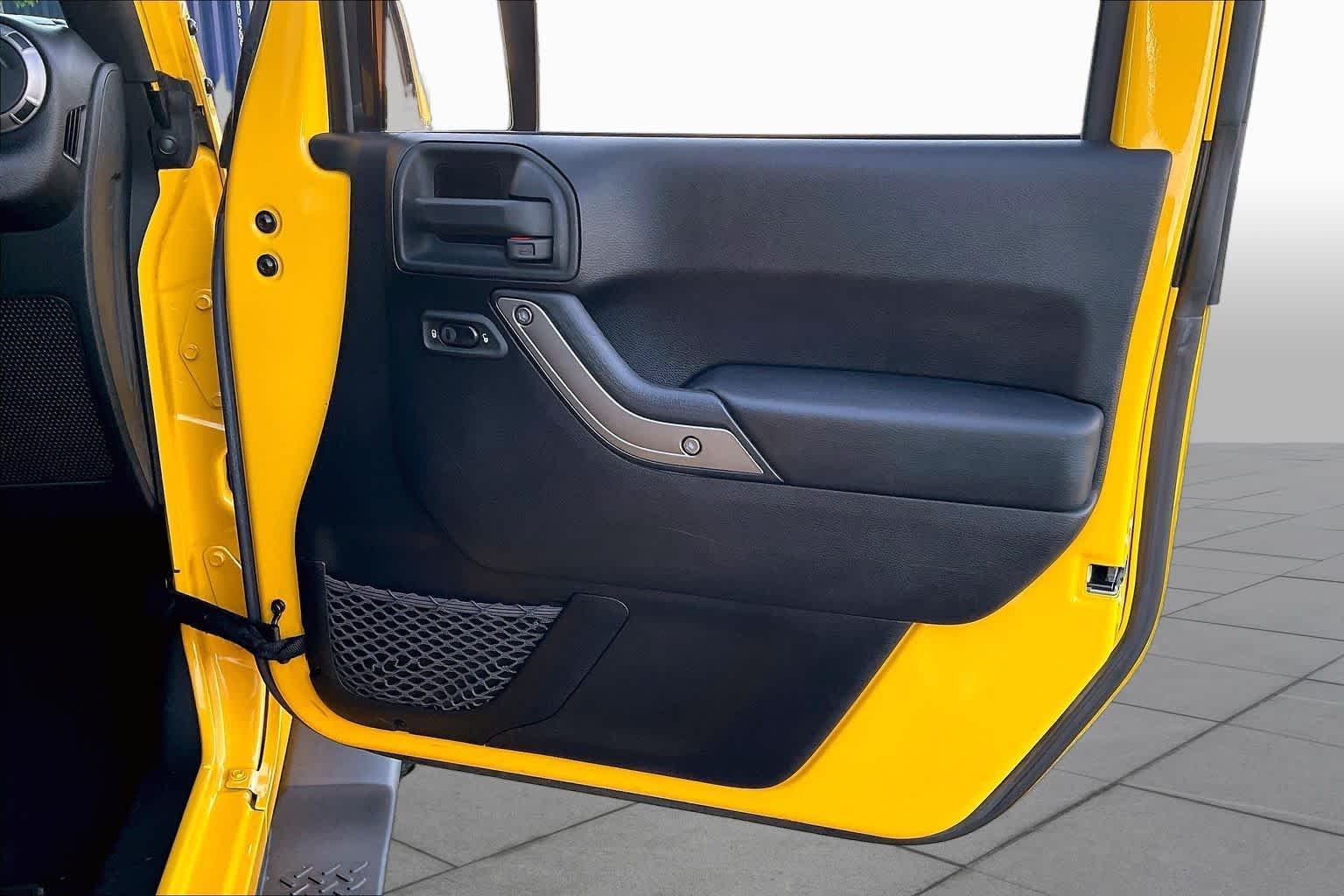 Used 2015 Baja Yellow Clearcoat Jeep Sport image 21