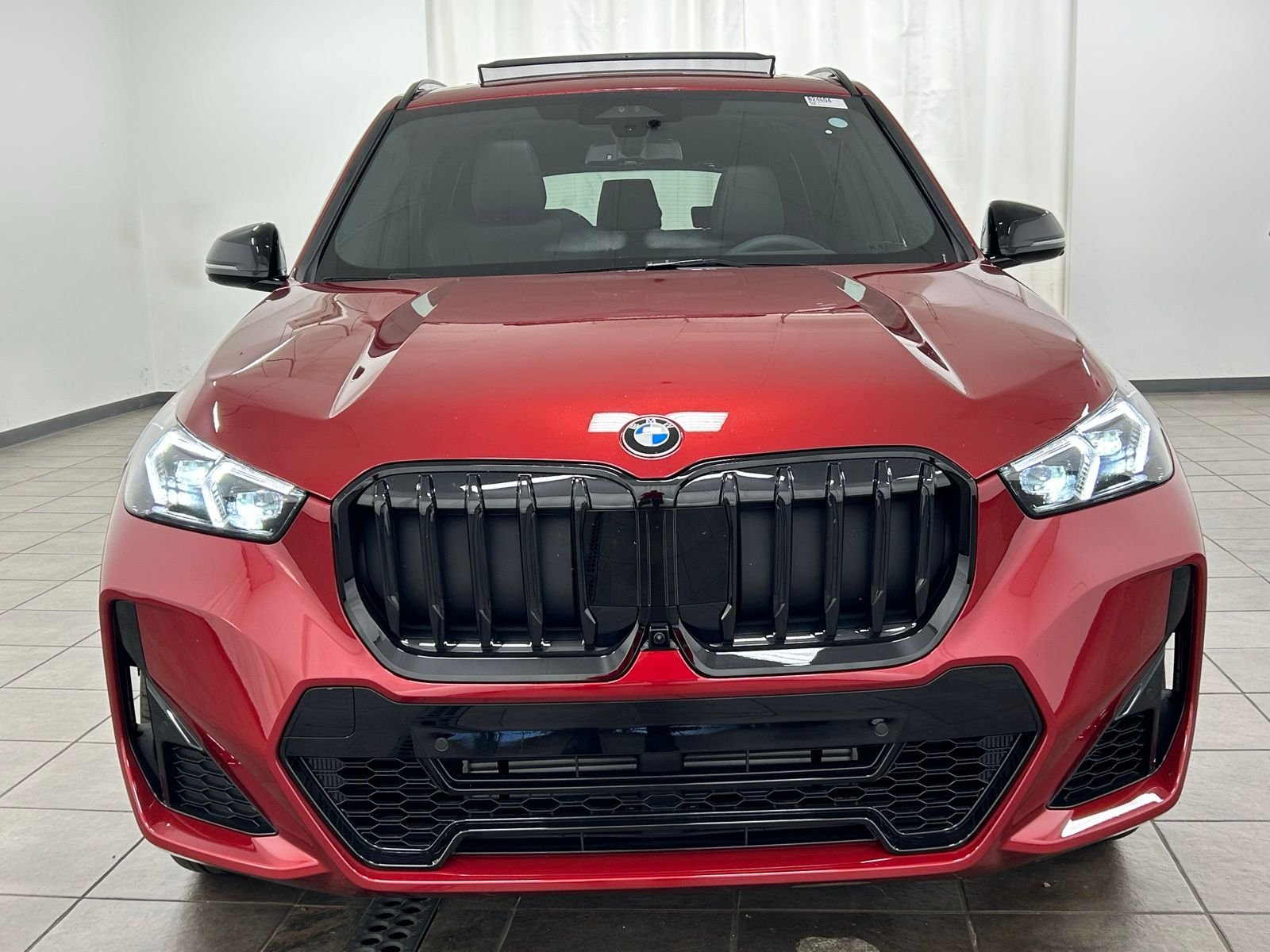 New 2026 Vegas Red Metallic BMW xDrive28i image 7