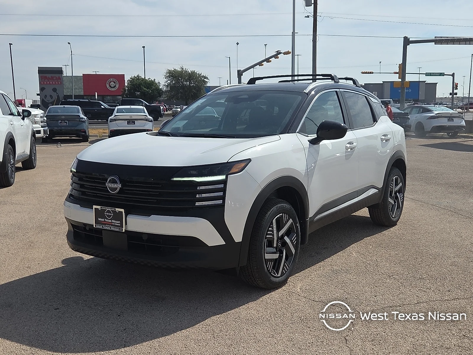 New 2026 XAB 2T White Black Nissan SV Front-Wheel Drive image 1