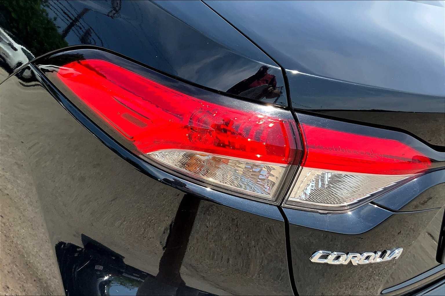 Used 2023 Midnight Black Metallic Toyota LE image 28