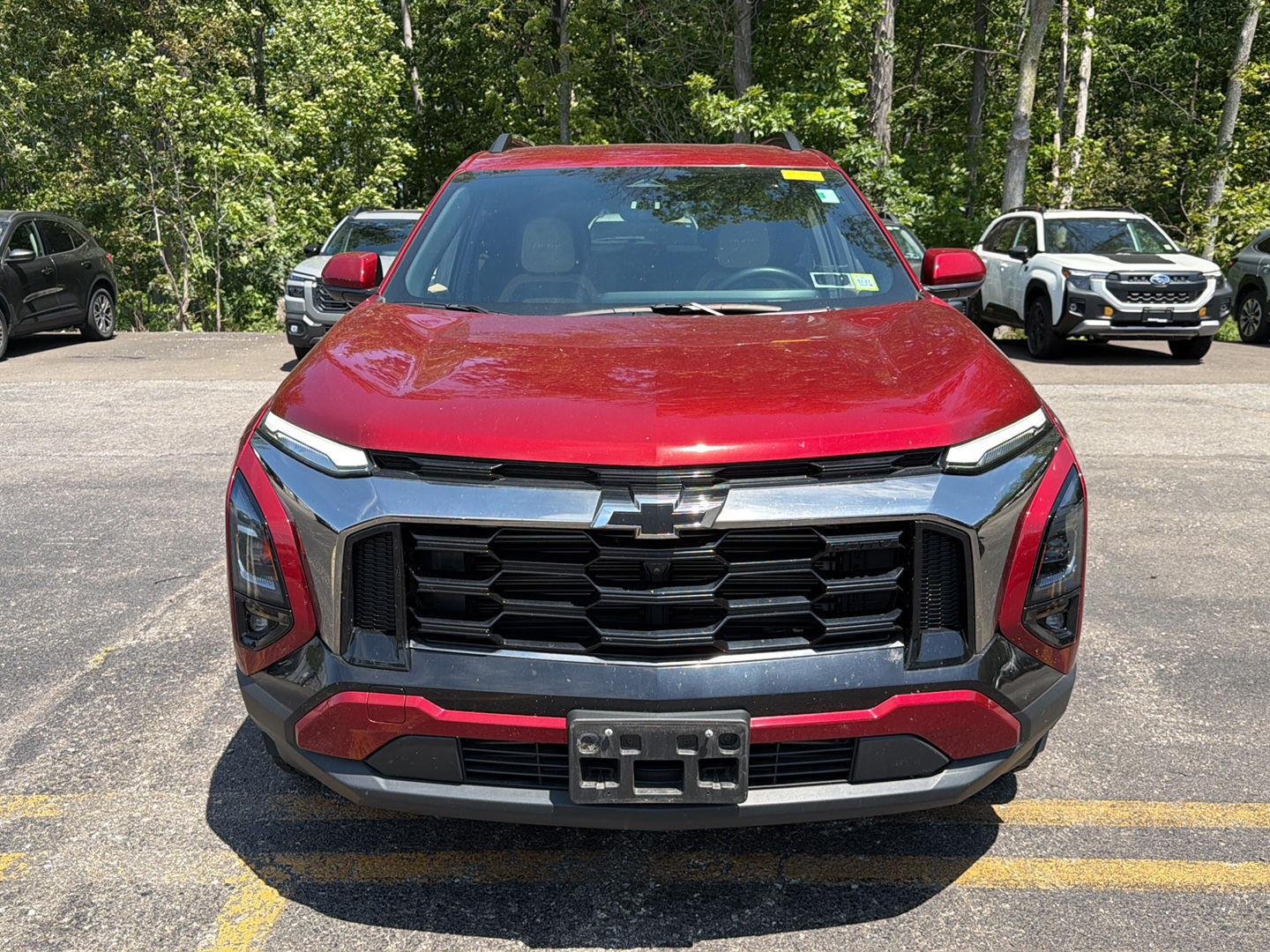 Used 2025 Radiant Red Tintcoat Chevrolet AWD ACTIV image 11