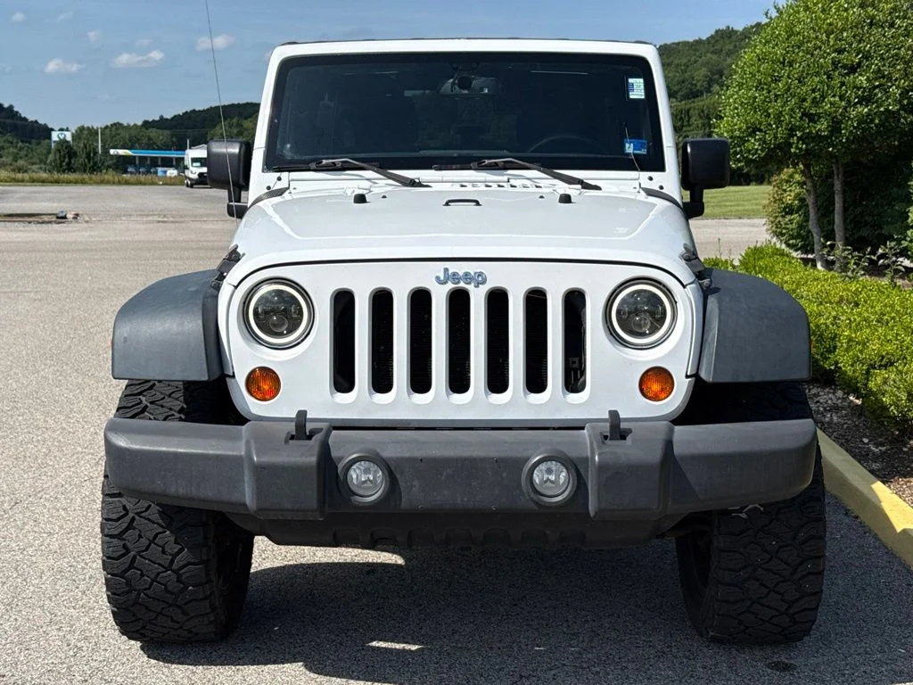 Used 2013 Bright White Jeep Unlimited Sport image 9