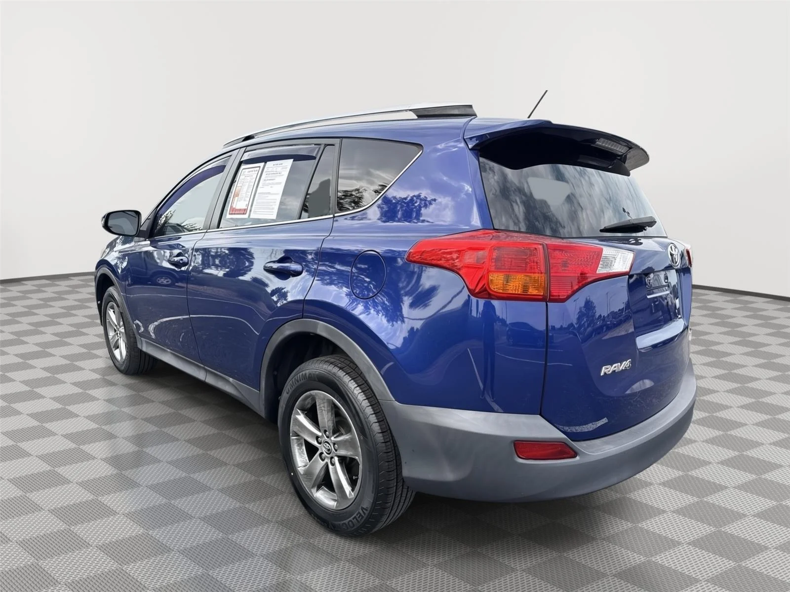 Used 2015 Blue Crush Metallic Toyota XLE image 9