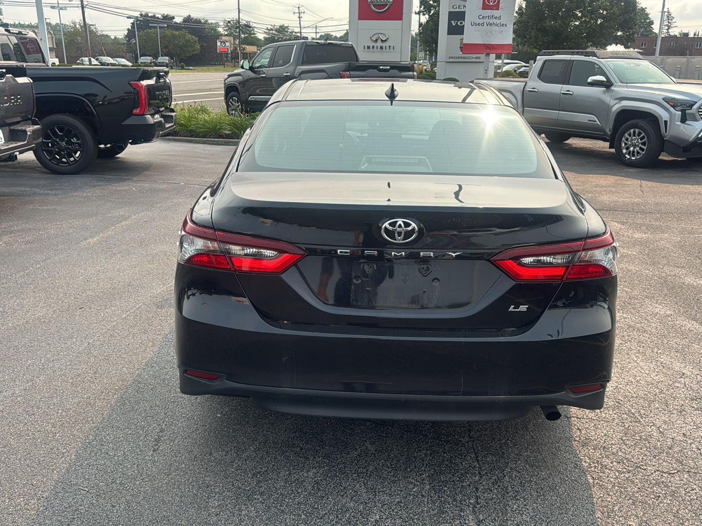 Used 2021 Midnight Black Metallic Toyota LE image 5