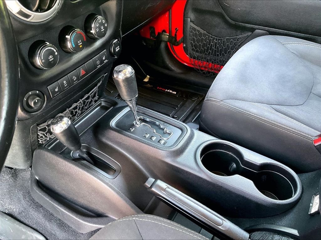 Used 2015 Red Jeep Unlimited Sahara image 19