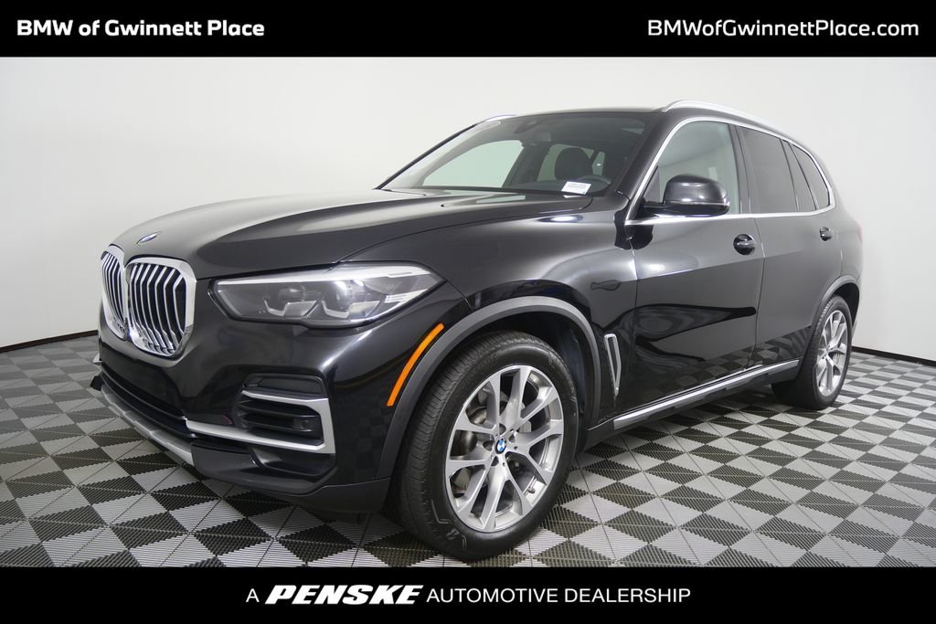 Used 2023 Black Sapphire Metallic BMW xDrive40i image 1
