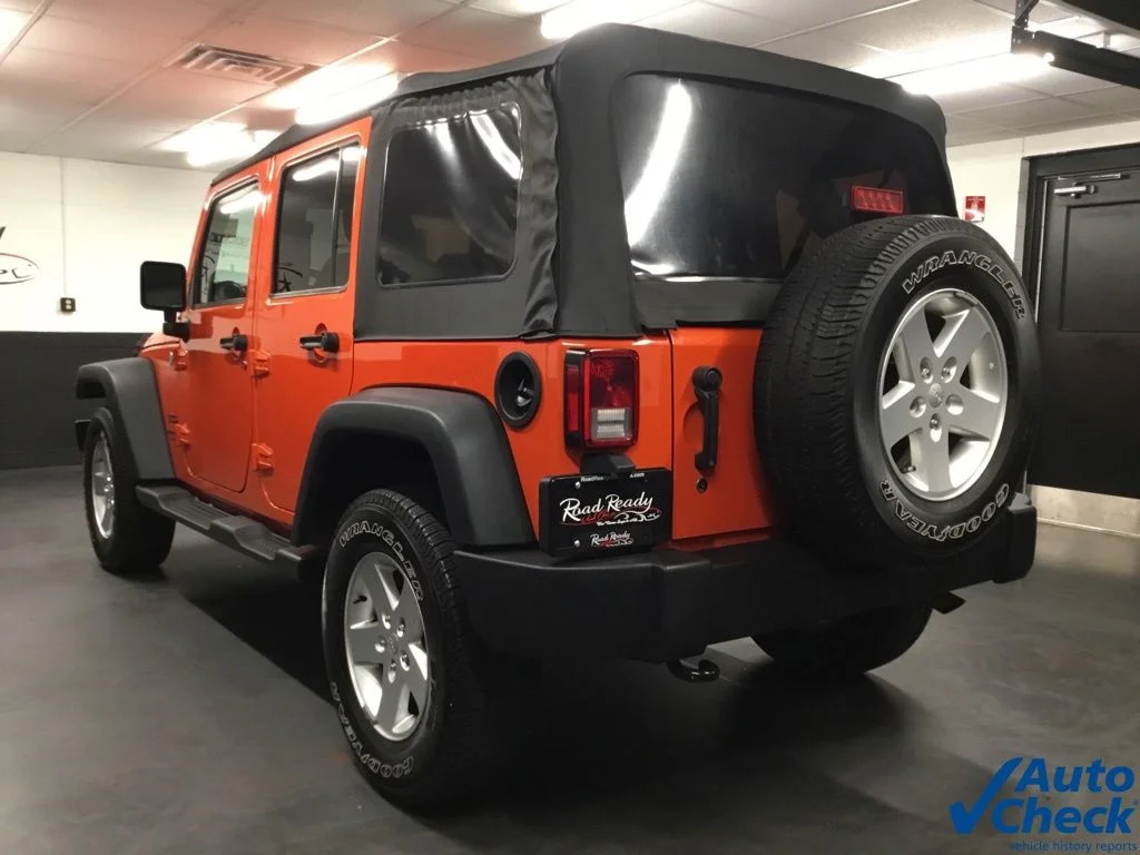 Used 2015 Orange Jeep Unlimited Sport image 8