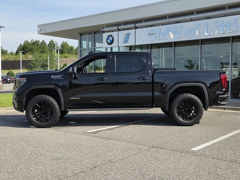 Used 2024 Onyx Black GMC 4WD CREW CAB 147" AT4 image 2