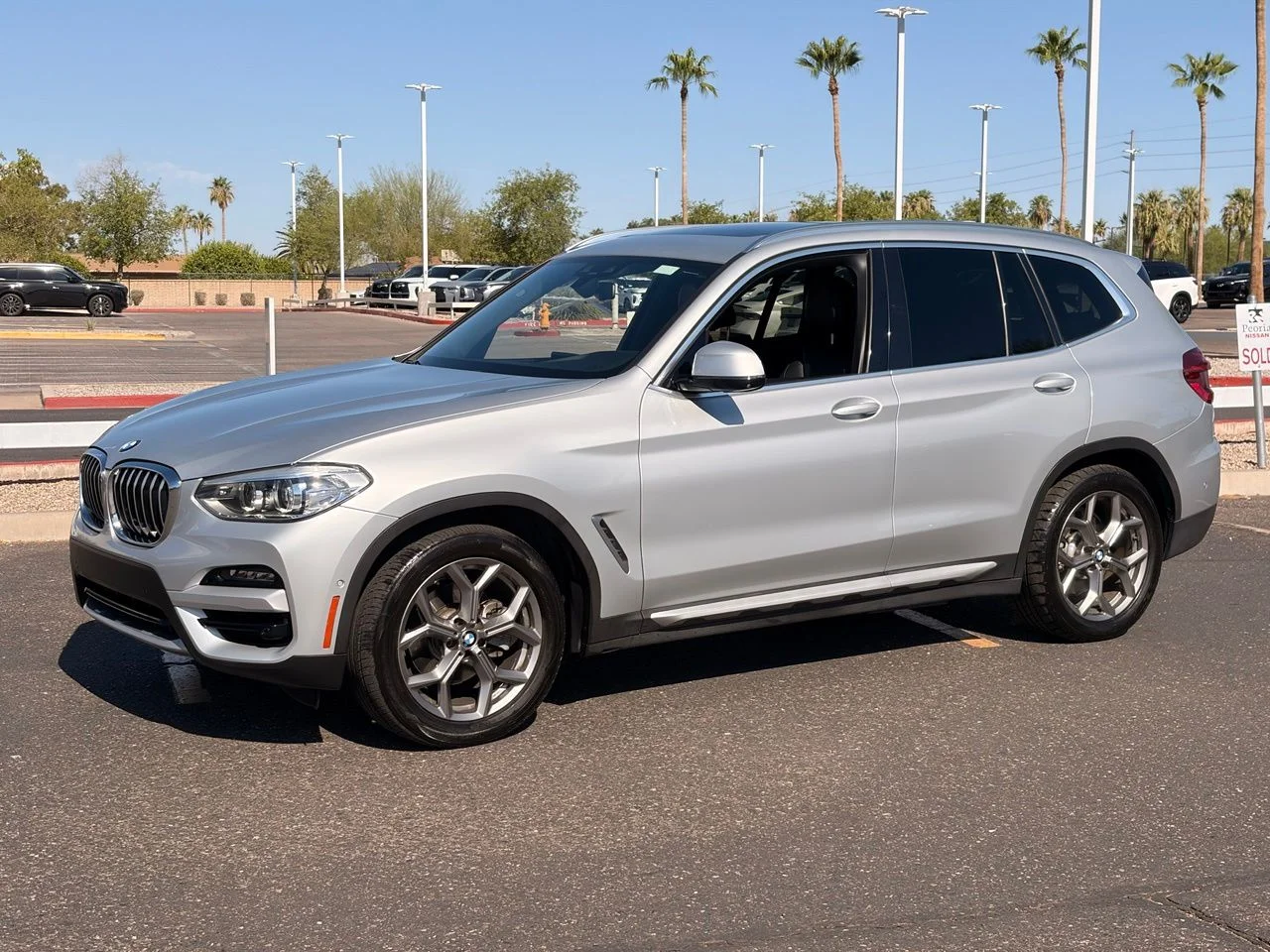 Used 2020 Glacier Silver Metallic BMW sDrive30i image 1