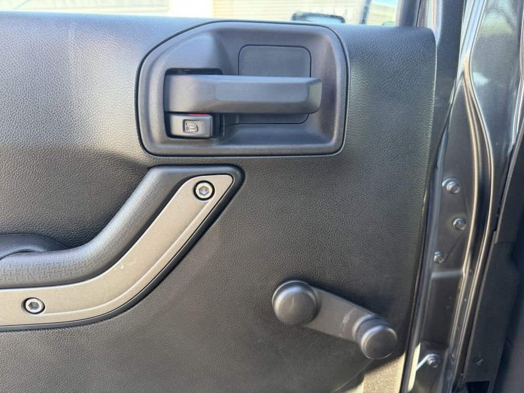 Used 2016 Granite Crystal Clearcoat Metallic Jeep Unlimited Sport image 23