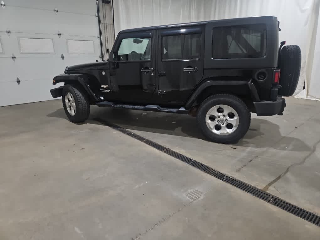 Used 2014 Jeep Wrangler Unlimited Sahara with VIN 1C4BJWEG8EL179182 for sale in Waterville, ME