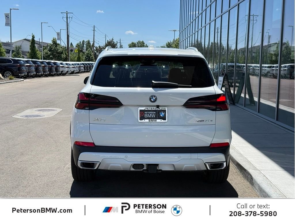 New 2026 Alpine White BMW xDrive50e image 4