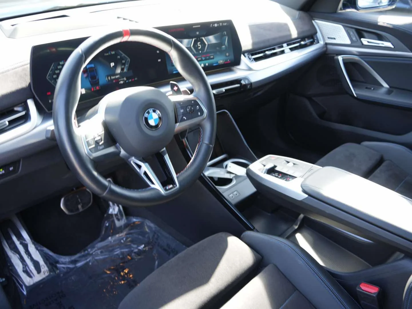 Used 2024 Frozen Portimao Blue II Metallic BMW M35i Sports Activity Coupe image 12