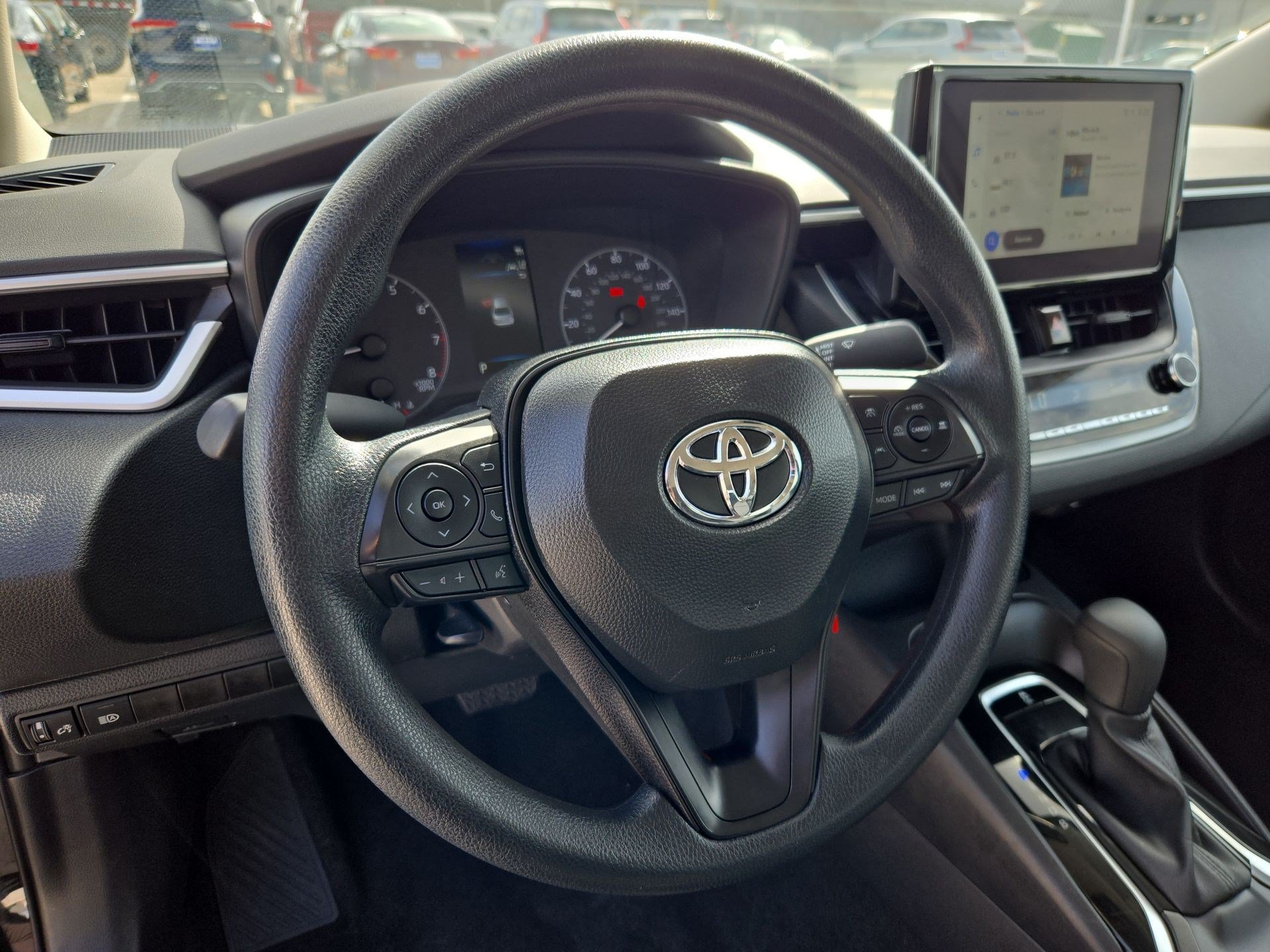 Used 2025 Midnight Black Metallic Toyota LE image 16