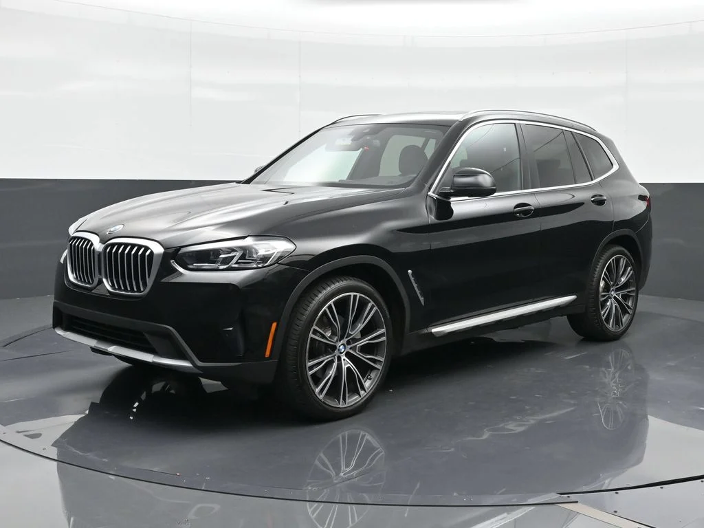 Used 2024 Black BMW sDrive30i image 1