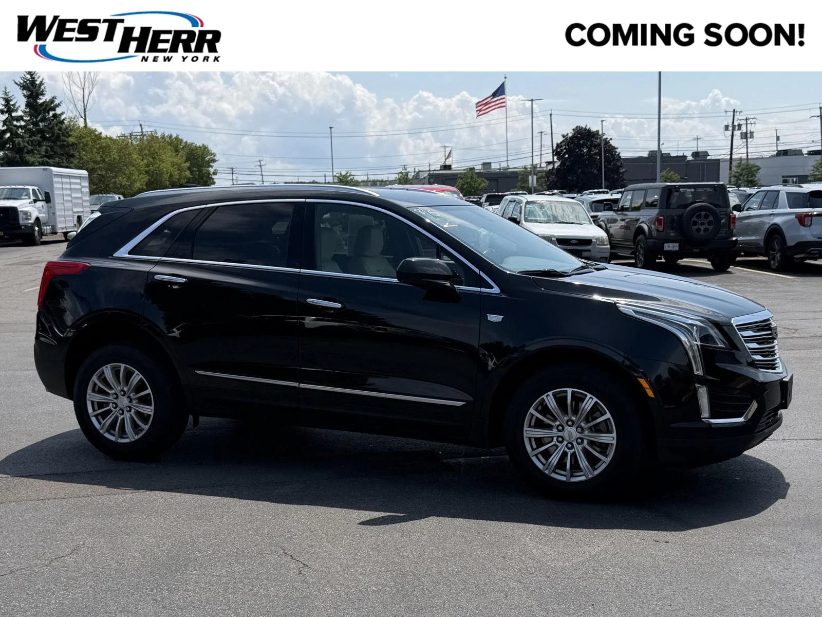 Used 2019 Stellar Black Metallic Cadillac FWD image 1