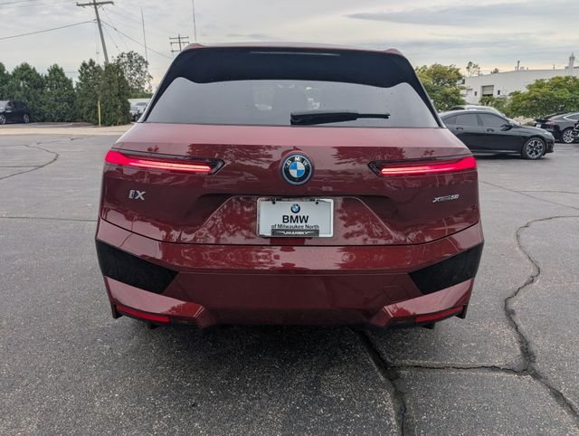 Certified Used 2024 Aventurin Red Metallic BMW xDrive50 image 4