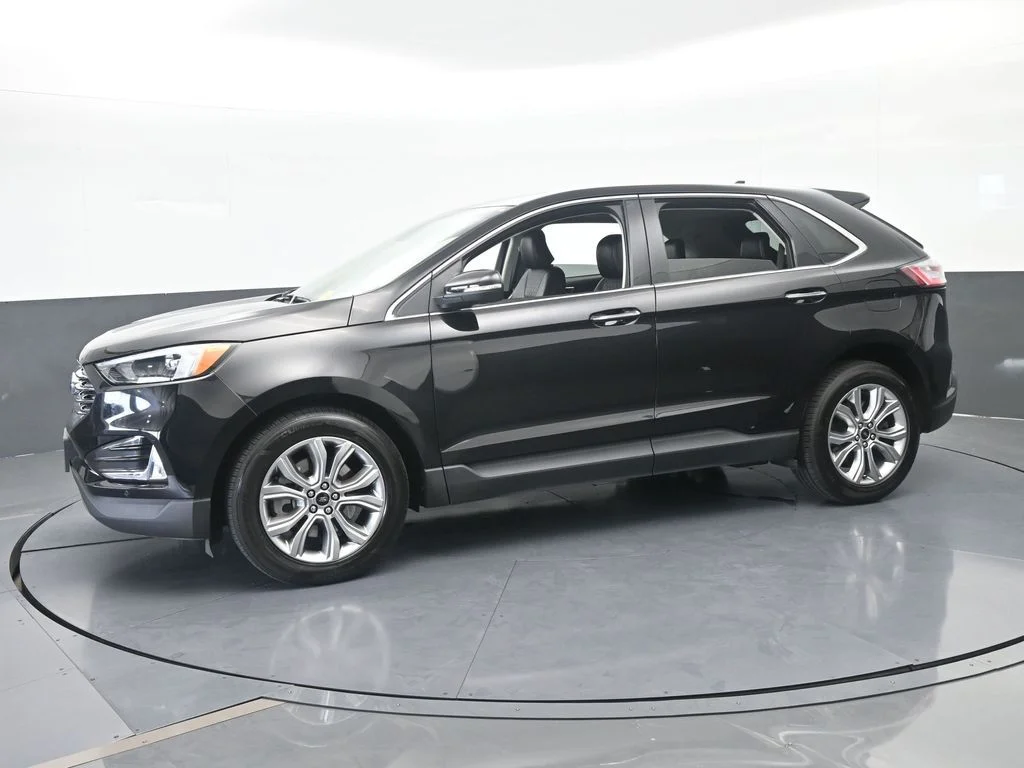 Used 2024 Black Metallic Ford Titanium image 2