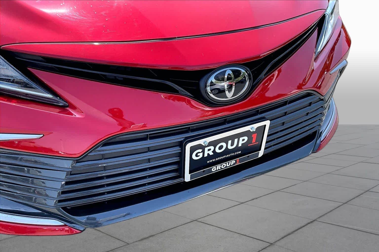 Used 2023 Supersonic Red Toyota LE image 29