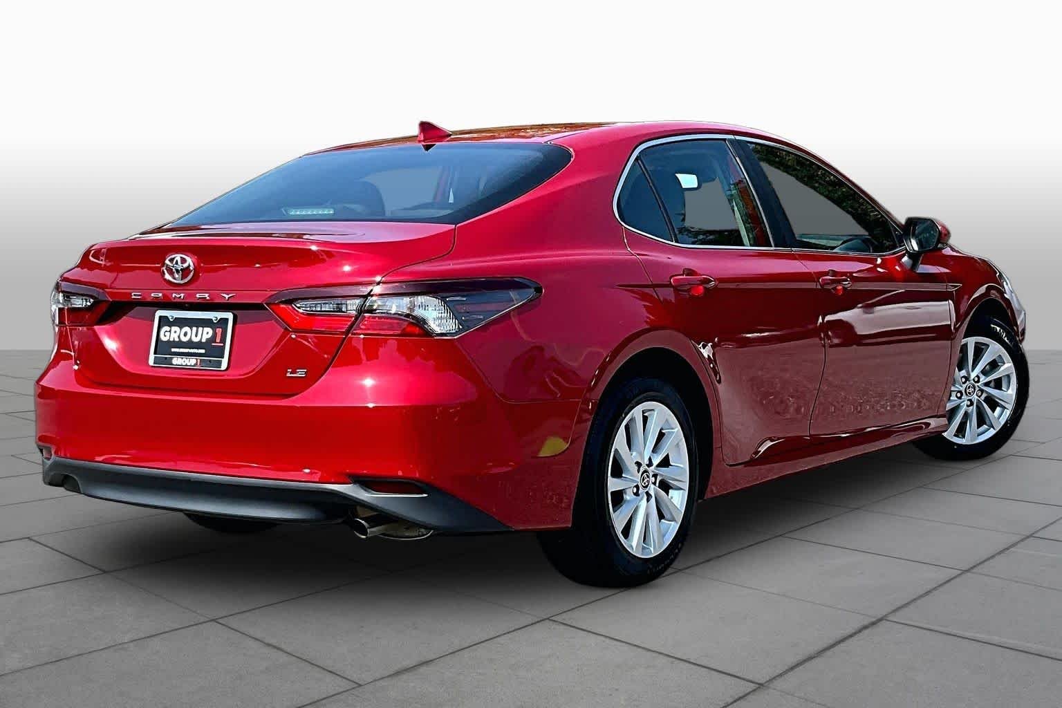 Used 2023 Supersonic Red Toyota LE image 13