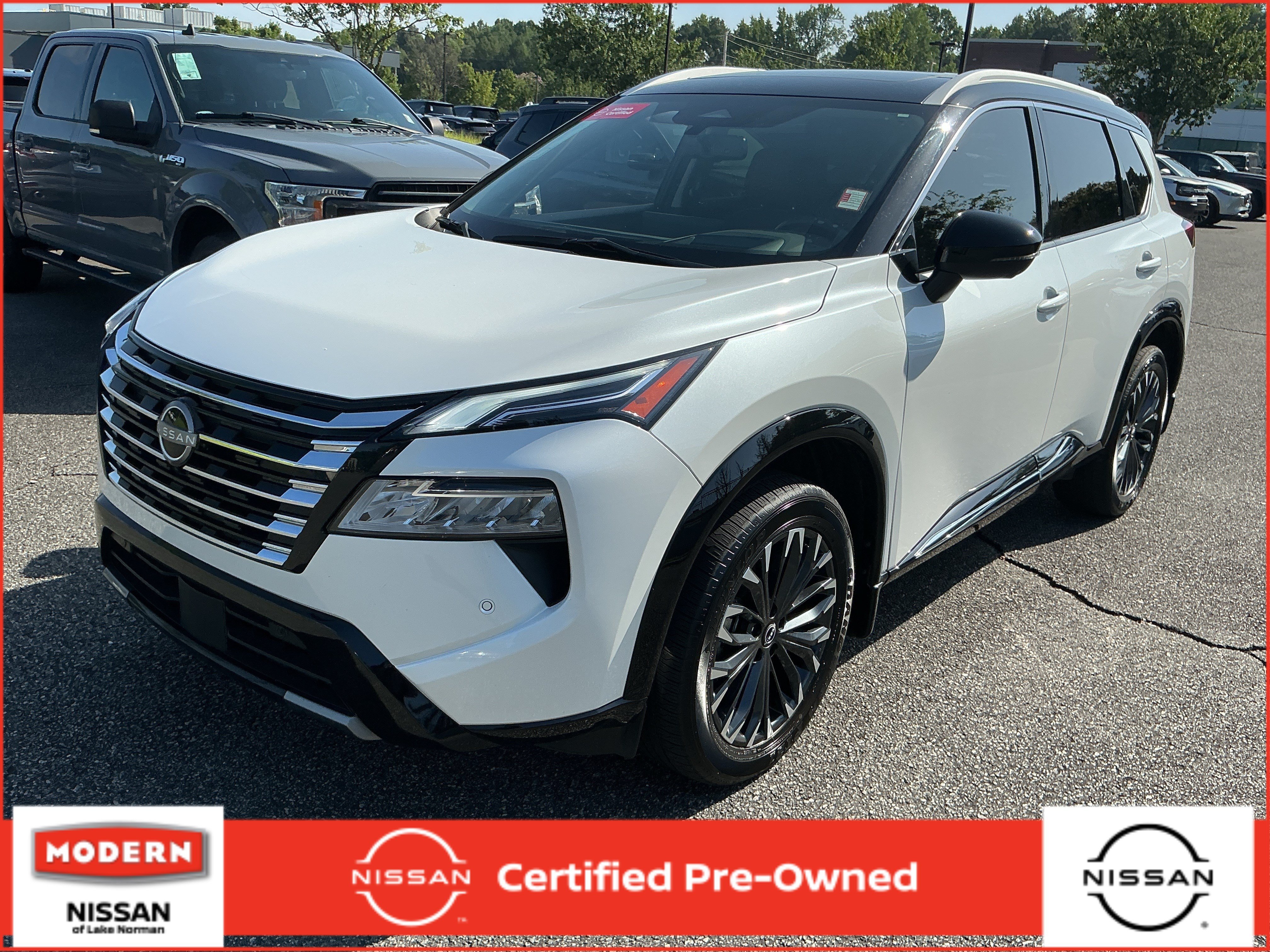 Used 2024 Everest White Pearl/Super Black Nissan Platinum image 1
