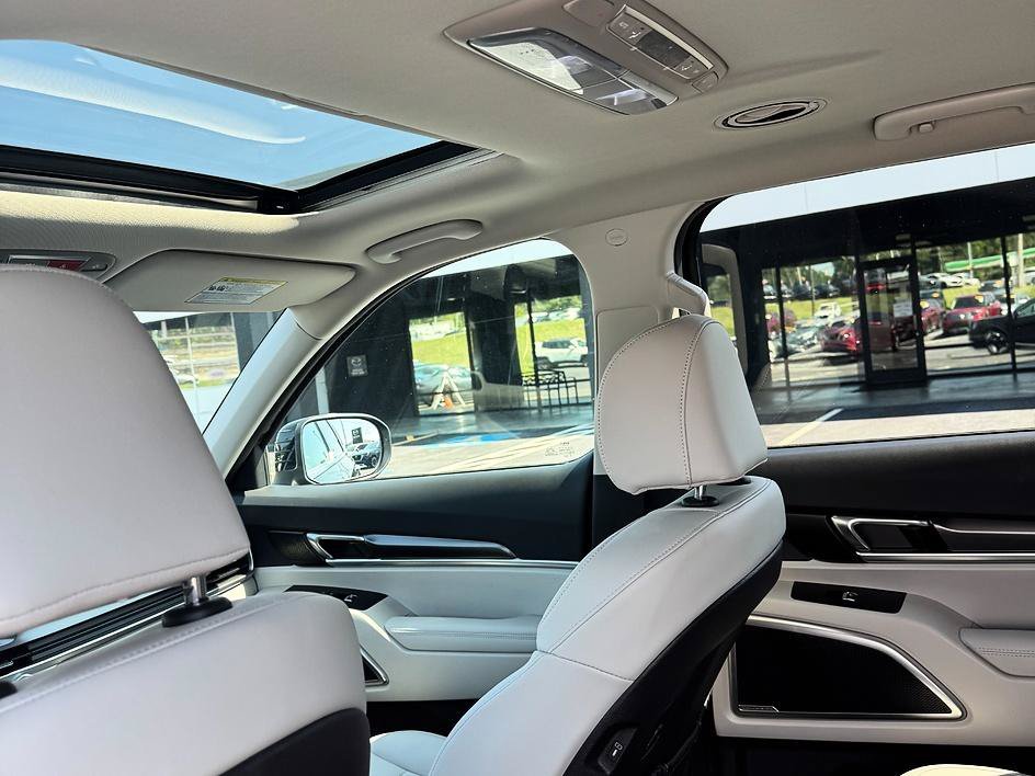 Used 2024 Ebony Black Kia S image 11