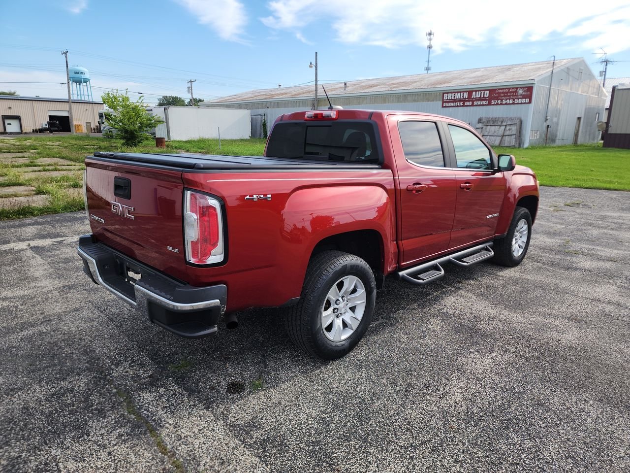 Used 2016 COPPER RED METALLIC GMC 4WD SLE image 8