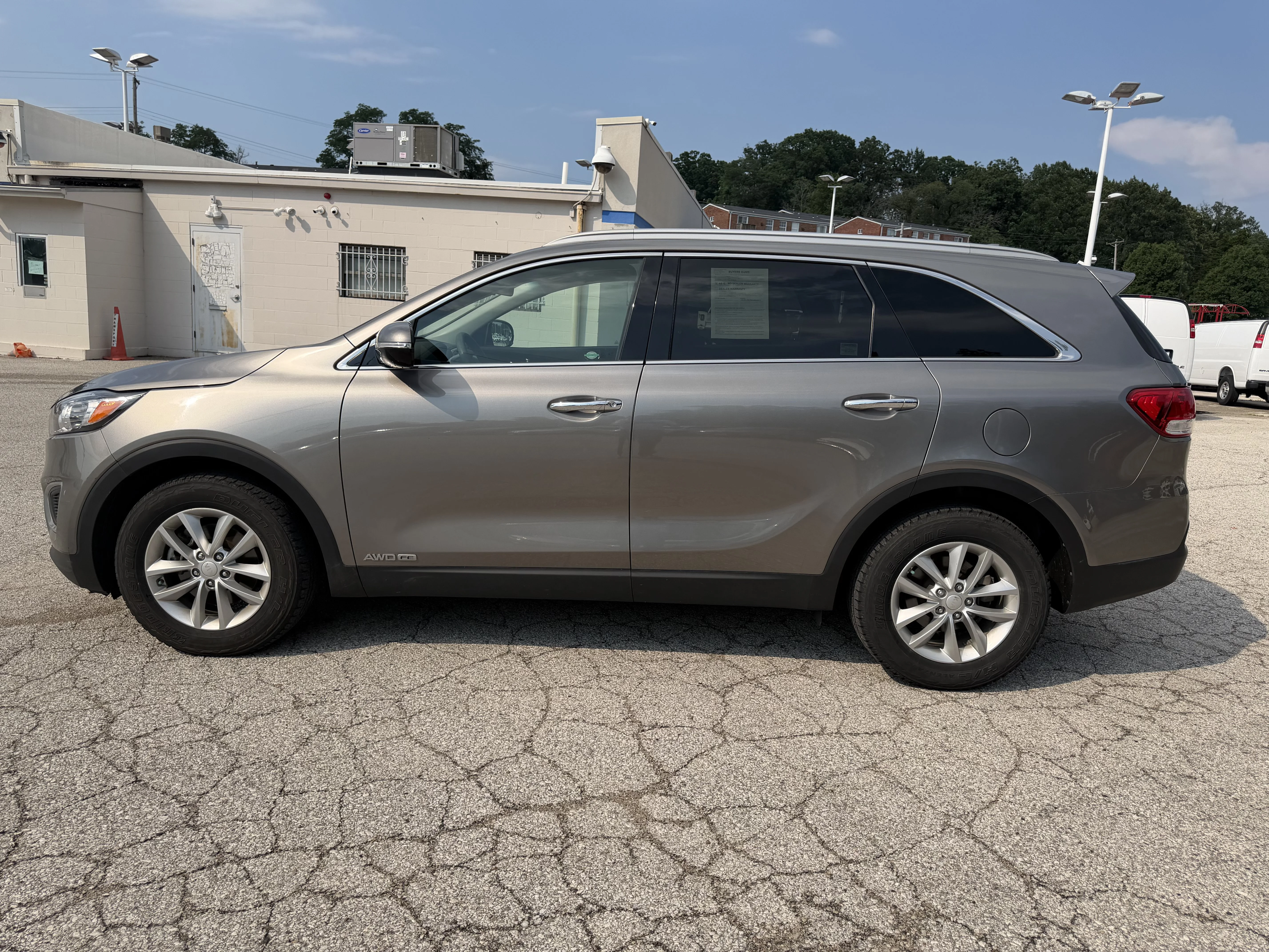 Used 2016 Titanium Silver Kia LX image 4