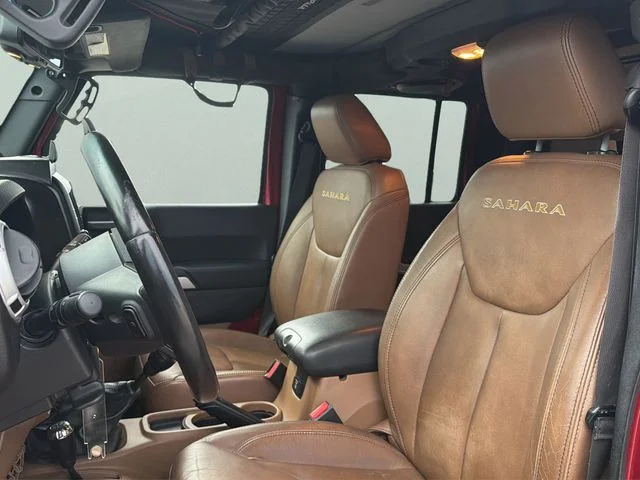 Used 2013 Red Jeep Unlimited Sahara image 16