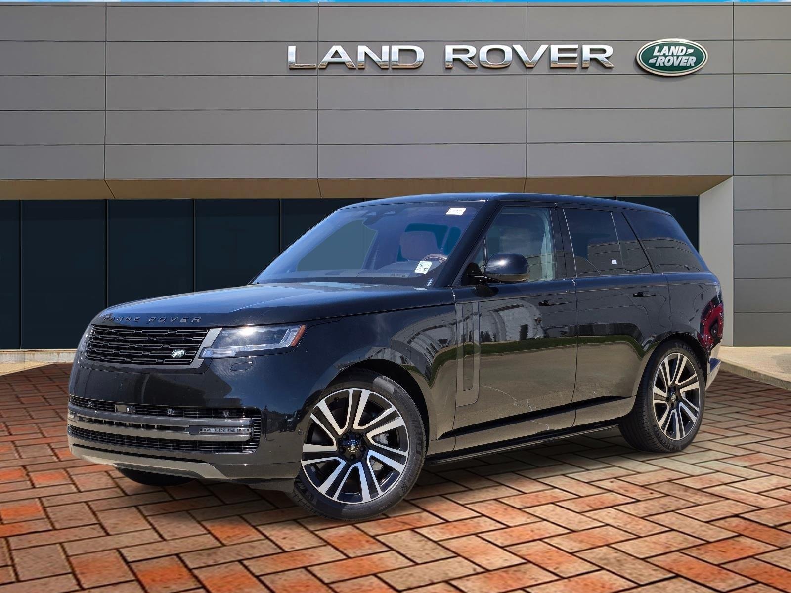 Used 2023 Santorini Black Metallic Land Rover SE image 1