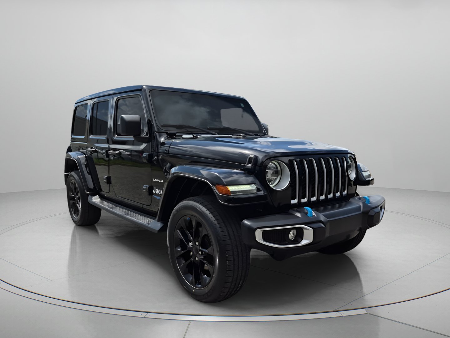 Used 2022 Black Clearcoat Jeep Unlimited Sahara 4xe image 1
