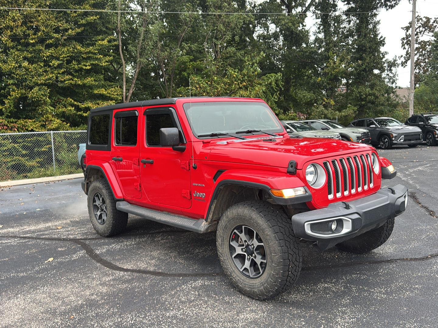 Used 2020 Firecracker Red Clearcoat Jeep Sahara image 1