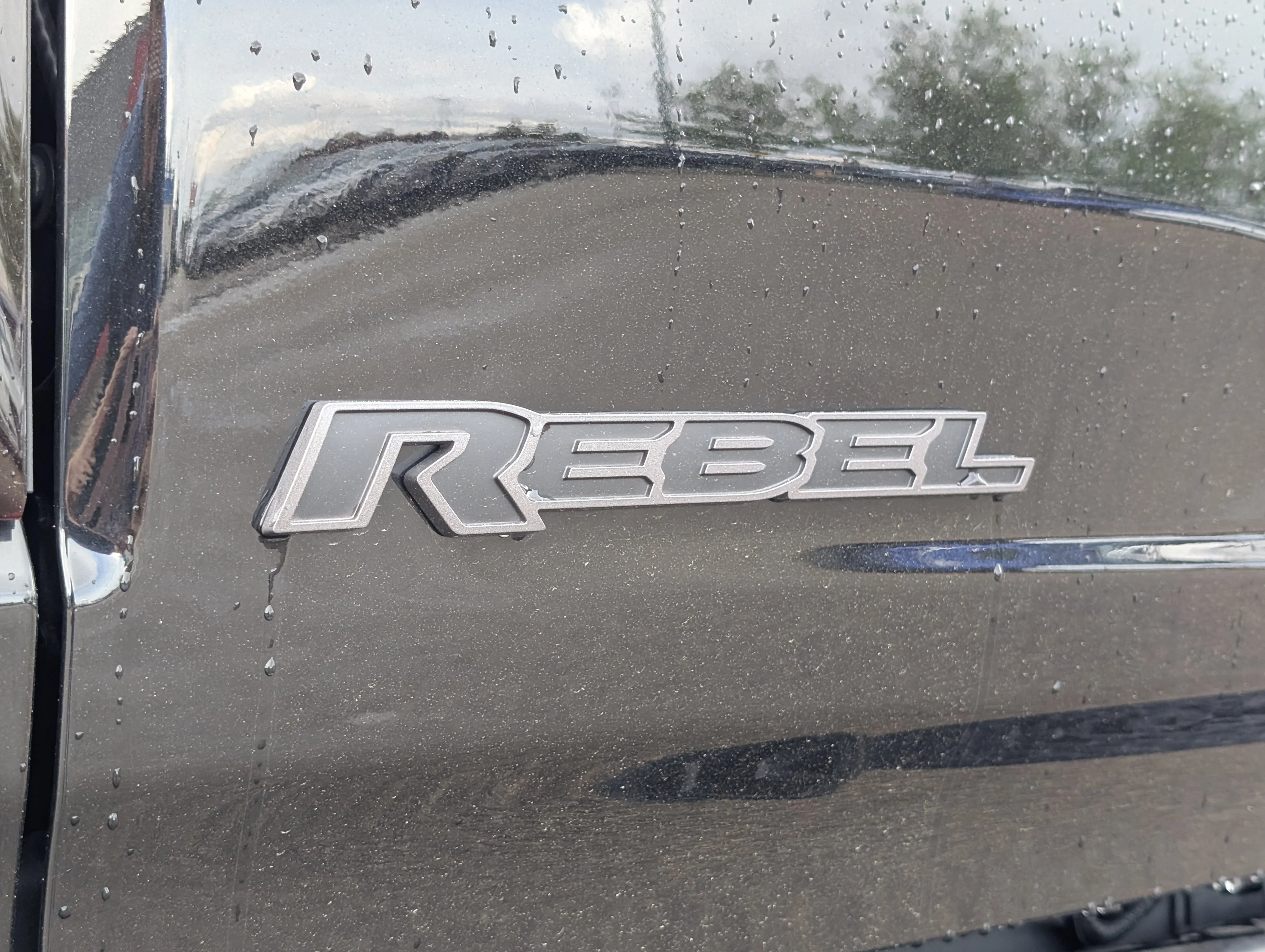 Used 2025 Diamond Black Crystal Pearlcoat Ram Rebel image 17