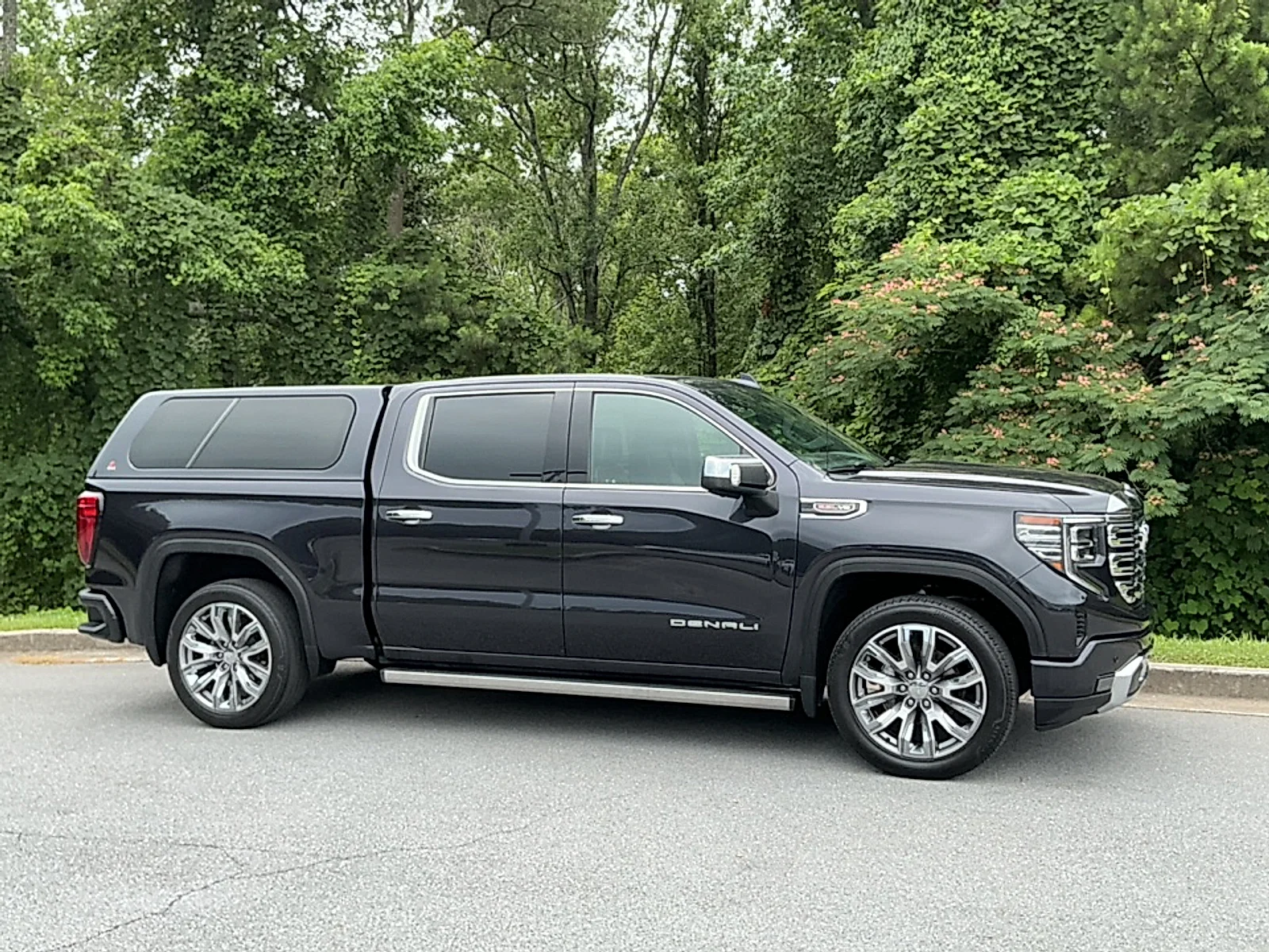 Used 2023 Titanium Rush Metallic GMC 4WD Crew Cab Short Box Denali image 1