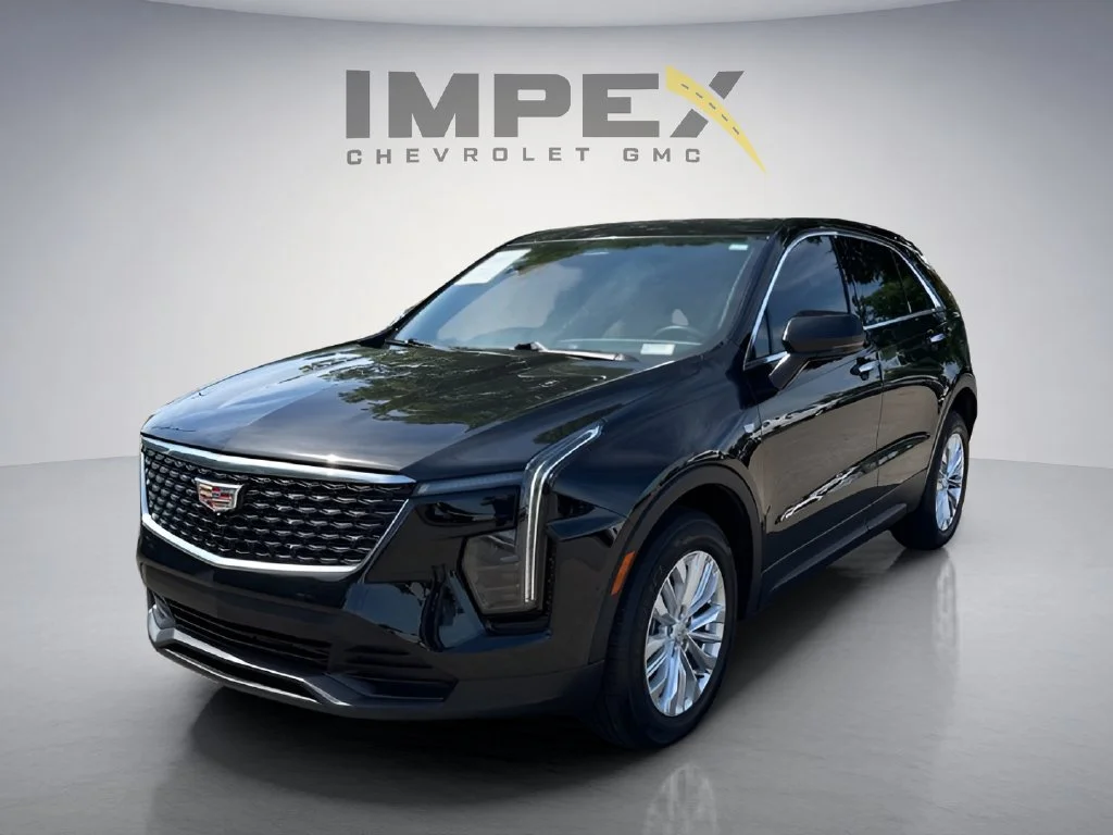 Used 2024 Stellar Black Metallic Cadillac Luxury image 1