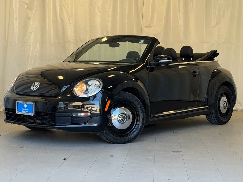 2013 Volkswagen Beetle 2.5L Conv. w/Sound & Nav. Auto's photo