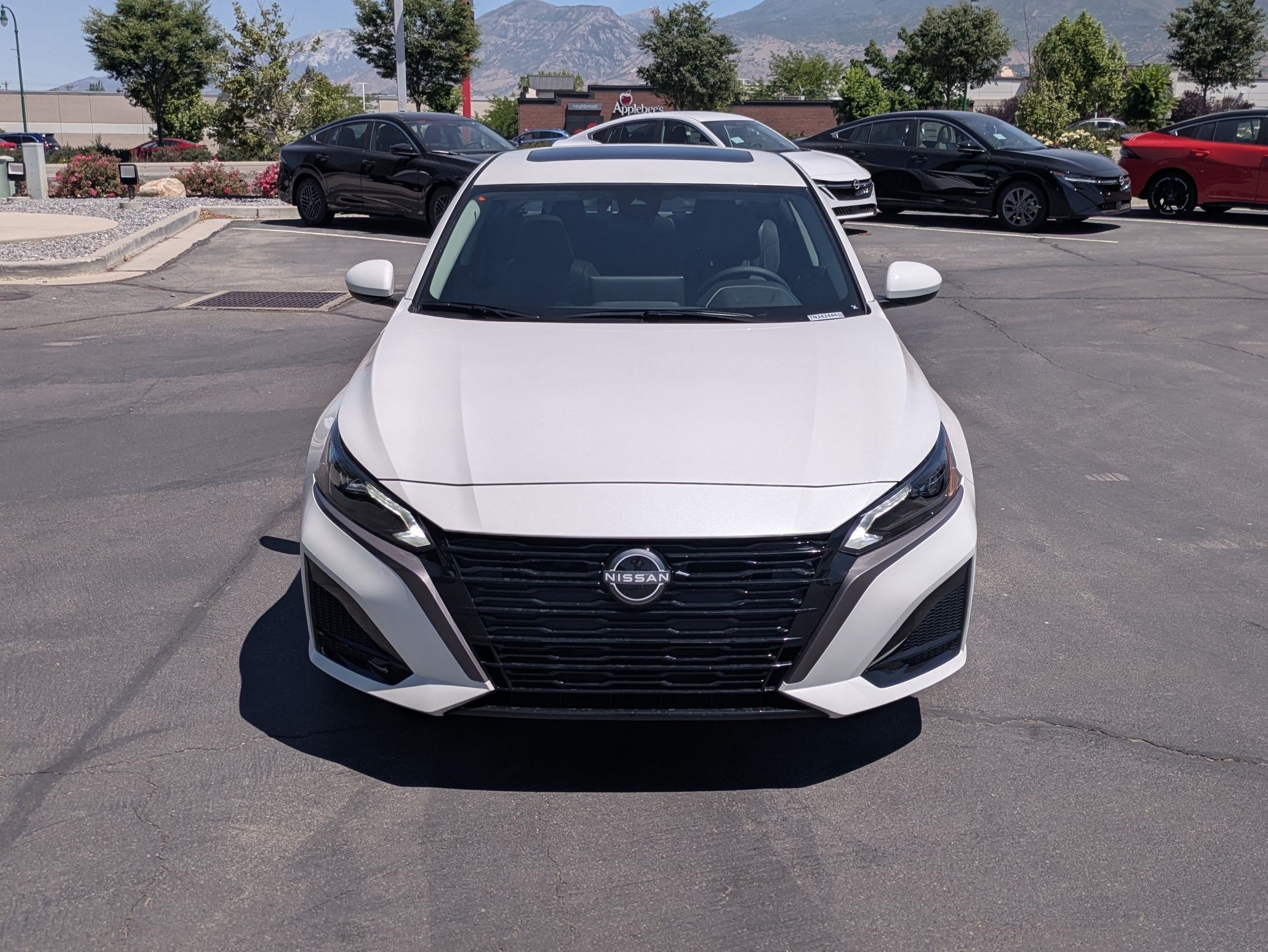 New 2026 Pearl White Tricoat Nissan SV image 9