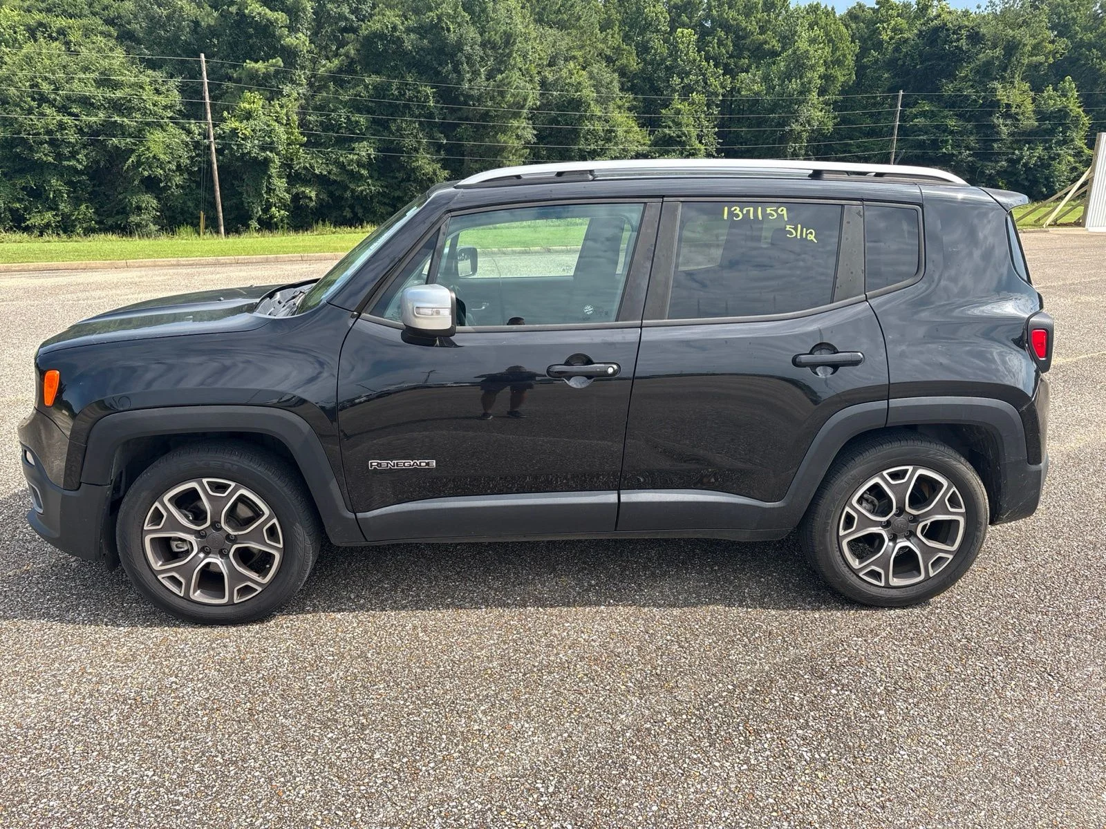 Used 2015 Black Jeep Limited image 1