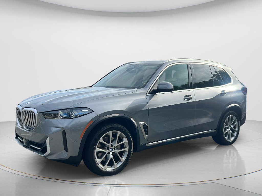 Certified Used 2024 Skyscraper Grey Metallic BMW xDrive40i image 1