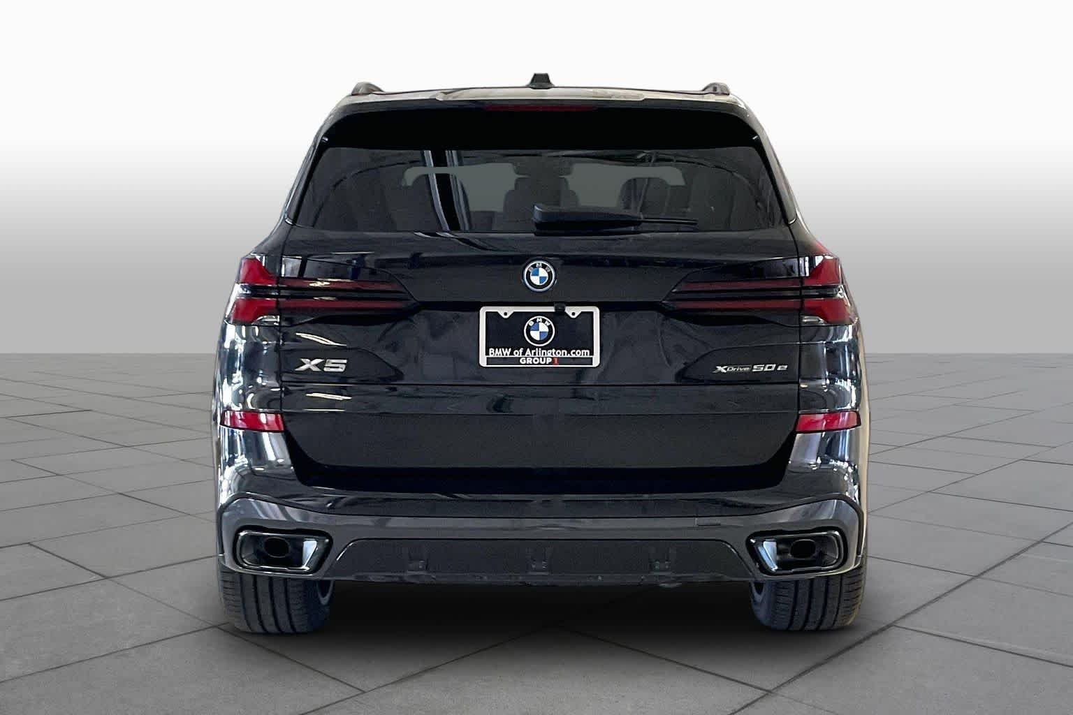New 2026 Black Sapphire Metallic BMW xDrive50e image 4