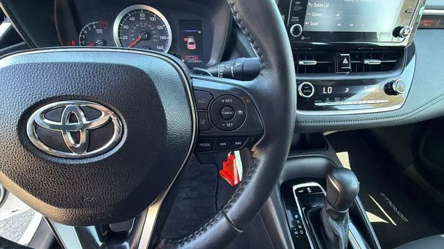 Used 2022 Black Sand Pearl Toyota SE image 28